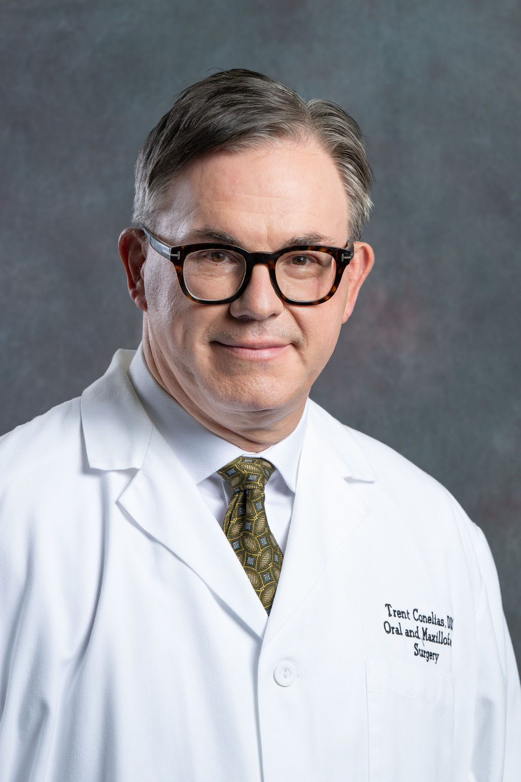 Dr. Trent Conelias